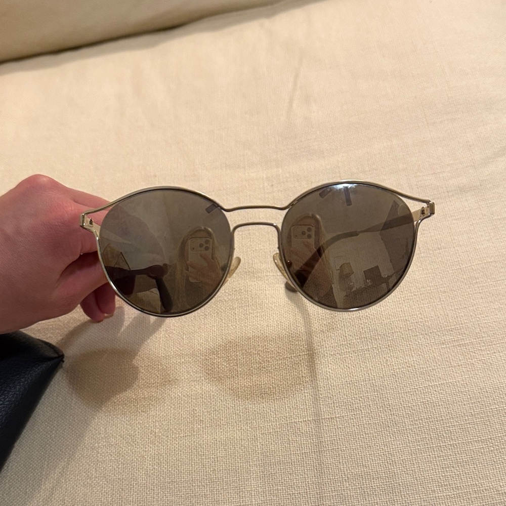 Prada Gold Sunglasses with Sleek Design